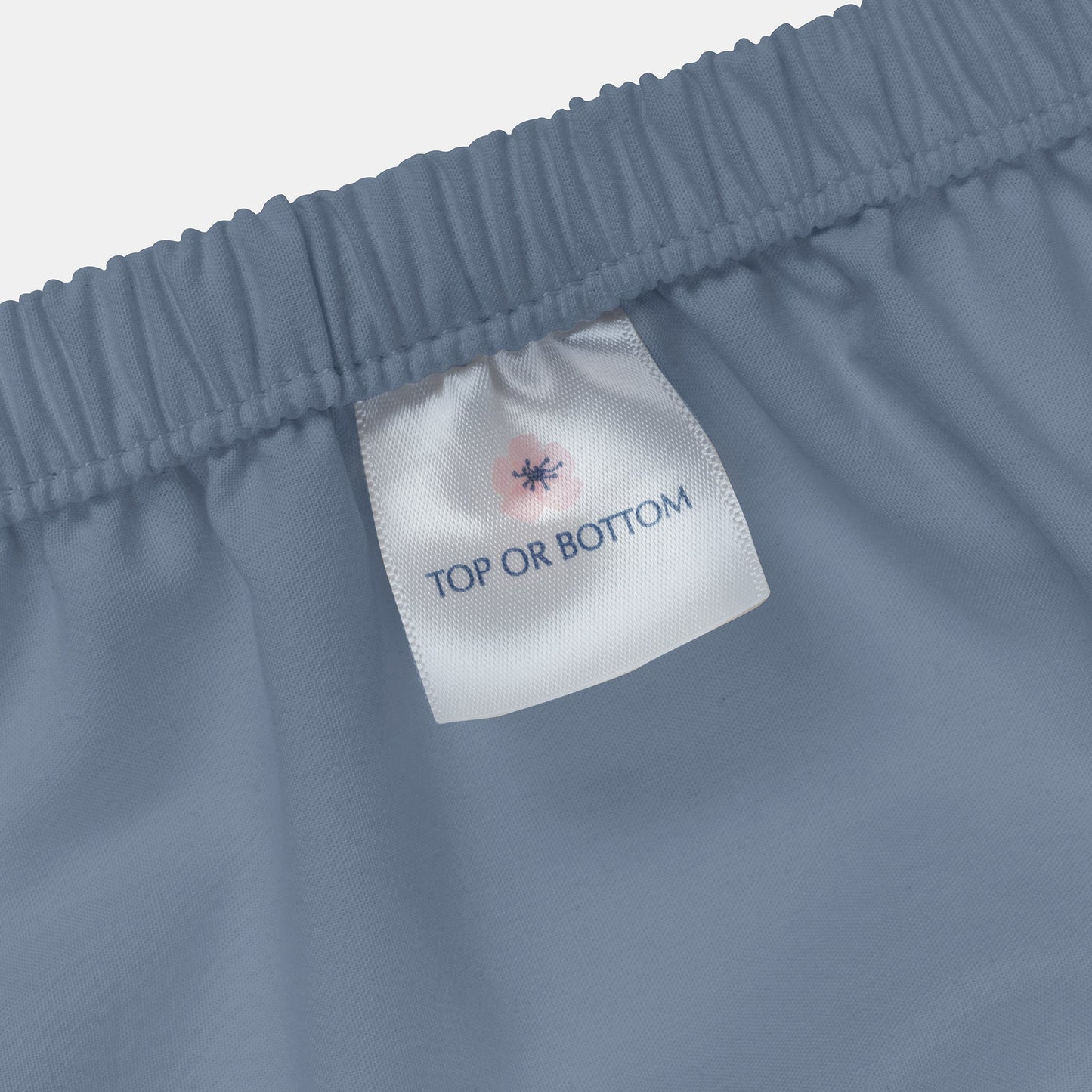 Close-up of Blue Sheet American Blossom Linens Top or Bottom Label