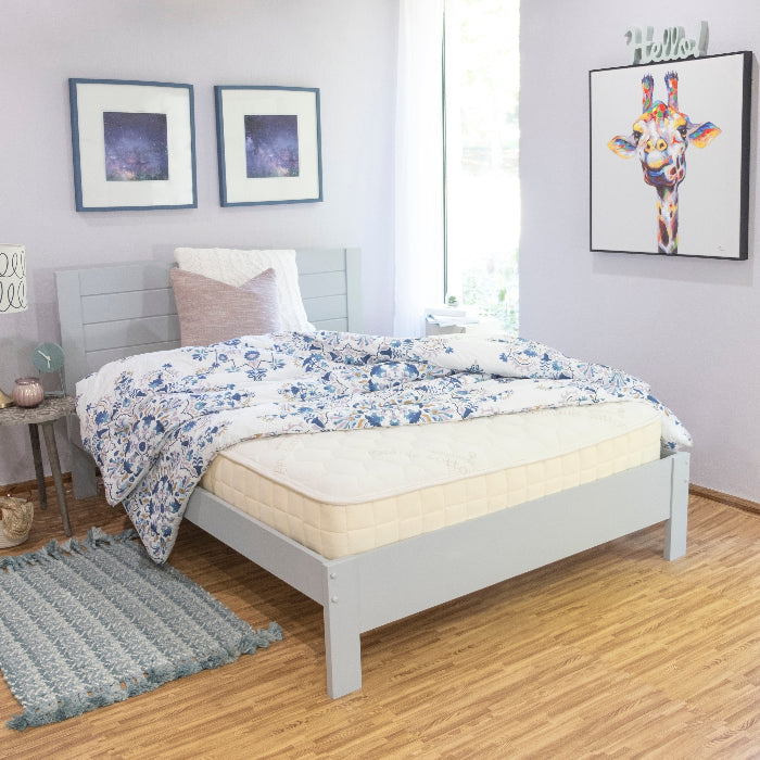 organic cotton mattress on grey bedframe 