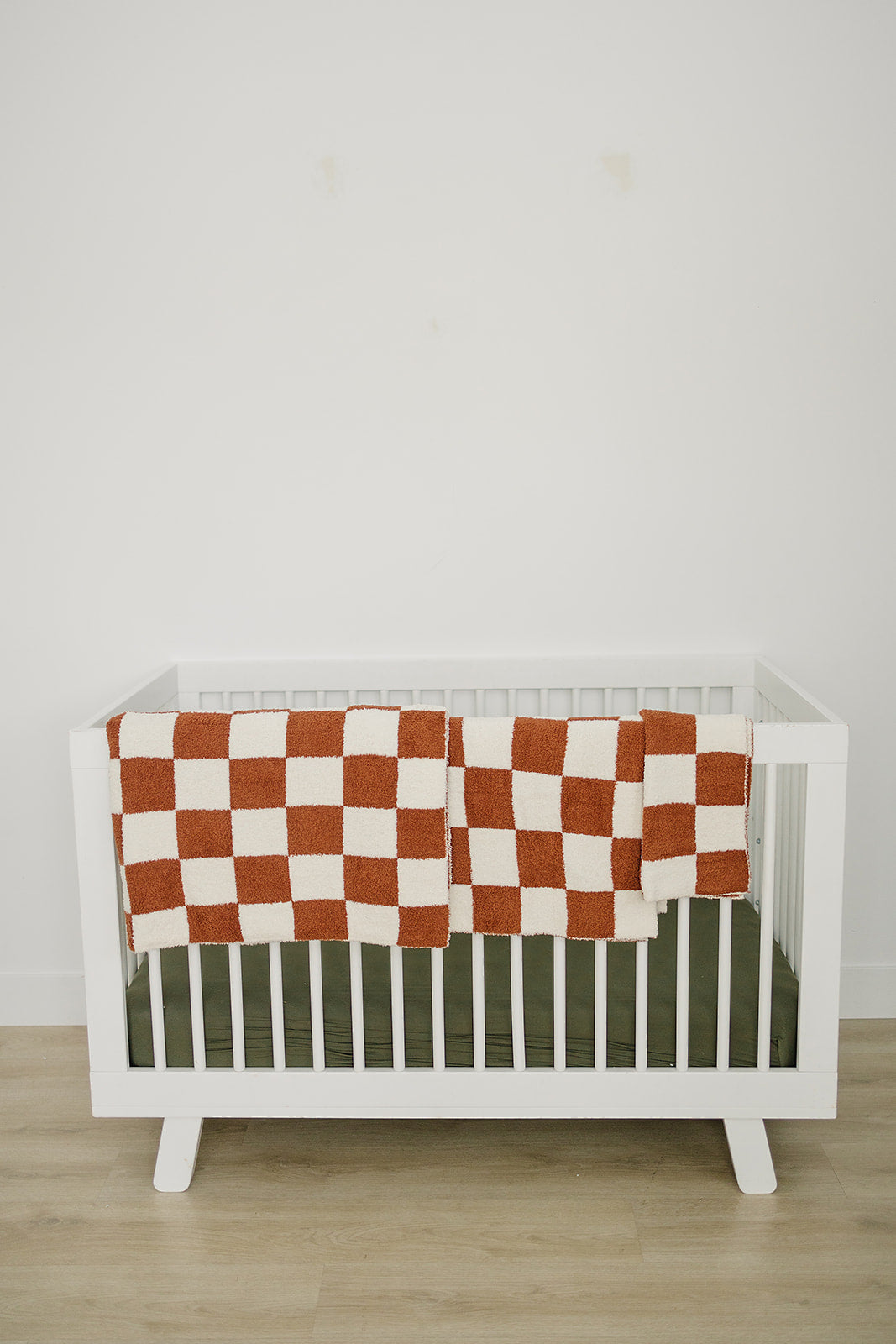 Rust Checkered Plush Blanket - Nature's Crib