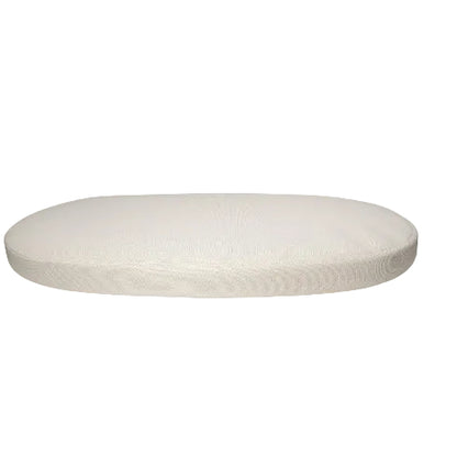 oval crib mattress on a white background